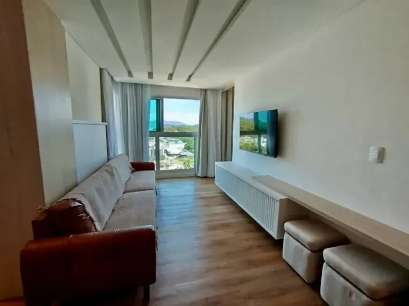 Apartamento vista mar mobiliado com 2 dormitórios sendo 1 suíte e 1 vaga de garagem na Brava