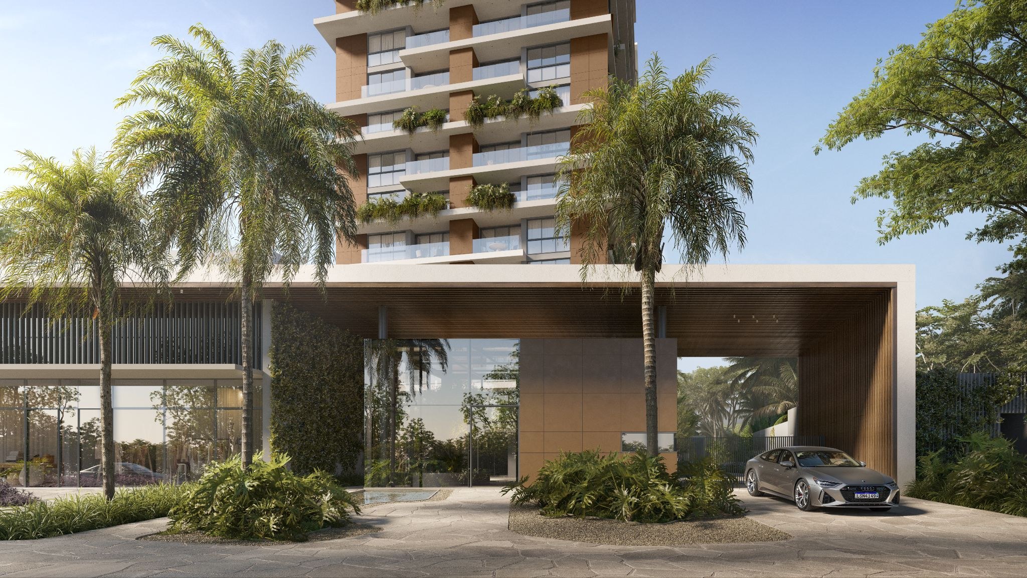 Isla Residencial Clube — portaria e acesso de veículos com paisagismo