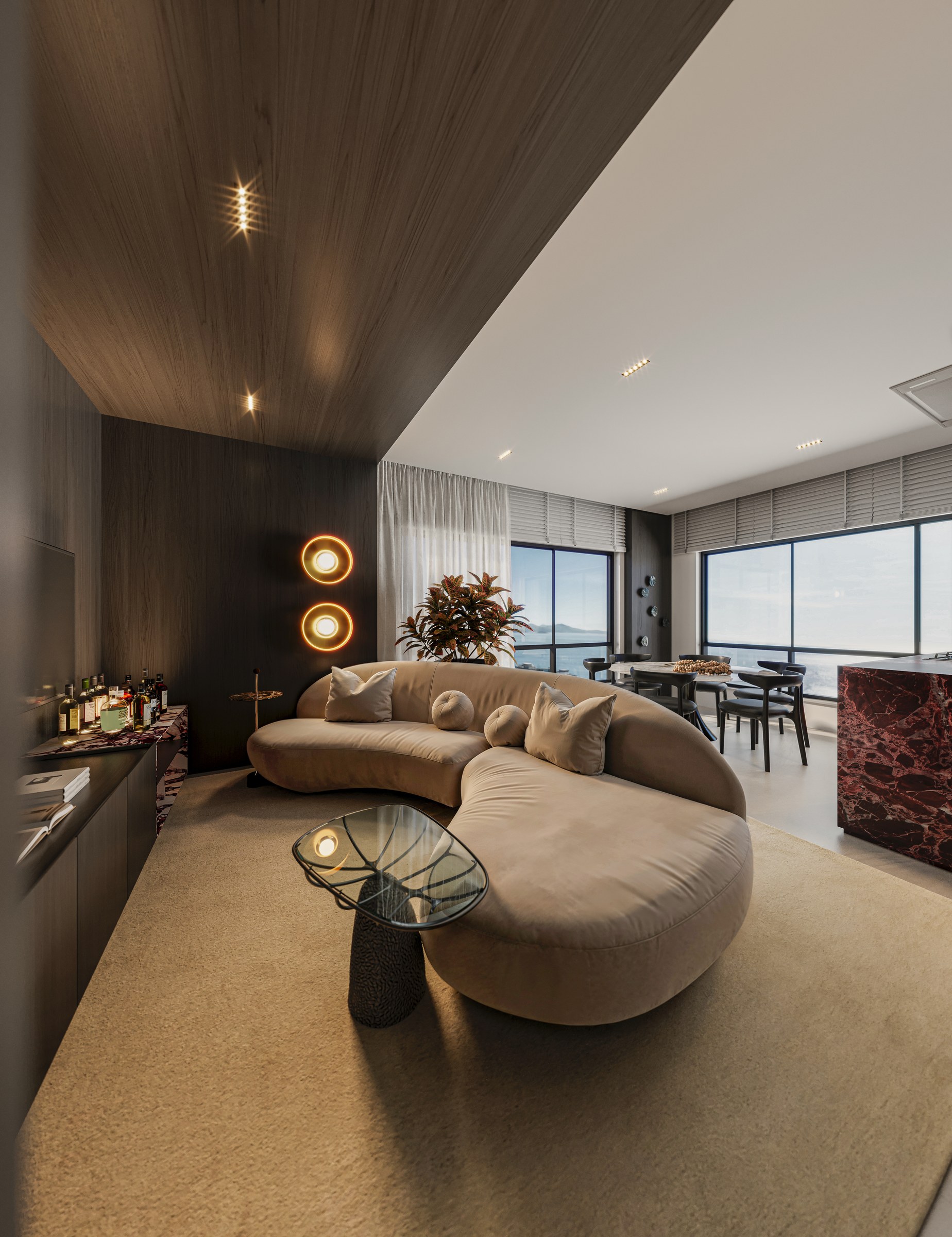 Terra Tower — living decorado com sofá curvo