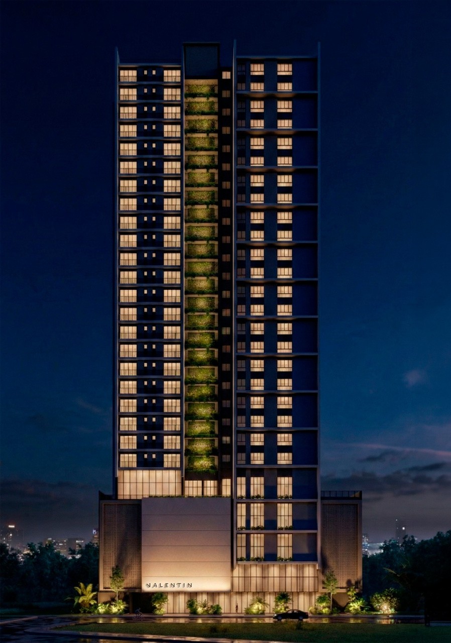 Valentin — Valentin, M.Santos Empreendimentos em Porto Belo SC: fachada noturna com a torre inteira e o jardim vertical iluminado, M Santos Empreendimentos, Porto Belo SC