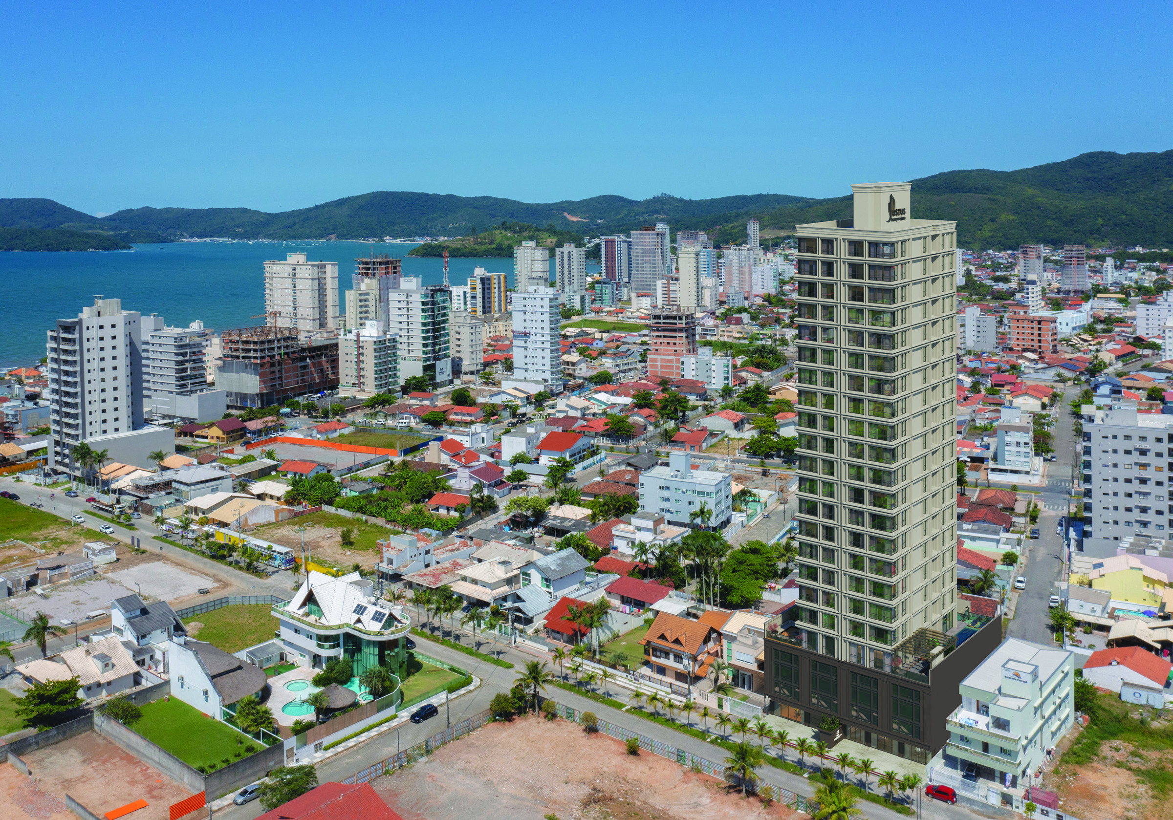 Villa Montemerano — Vista aérea do Villa Montemerano Residence na Av. Dorvalino Voltolini, Balneário Perequê, com o mar e os morros de Porto Belo ao fundo, Justus Incorporadora, Balneário Perequê, Porto Belo SC
